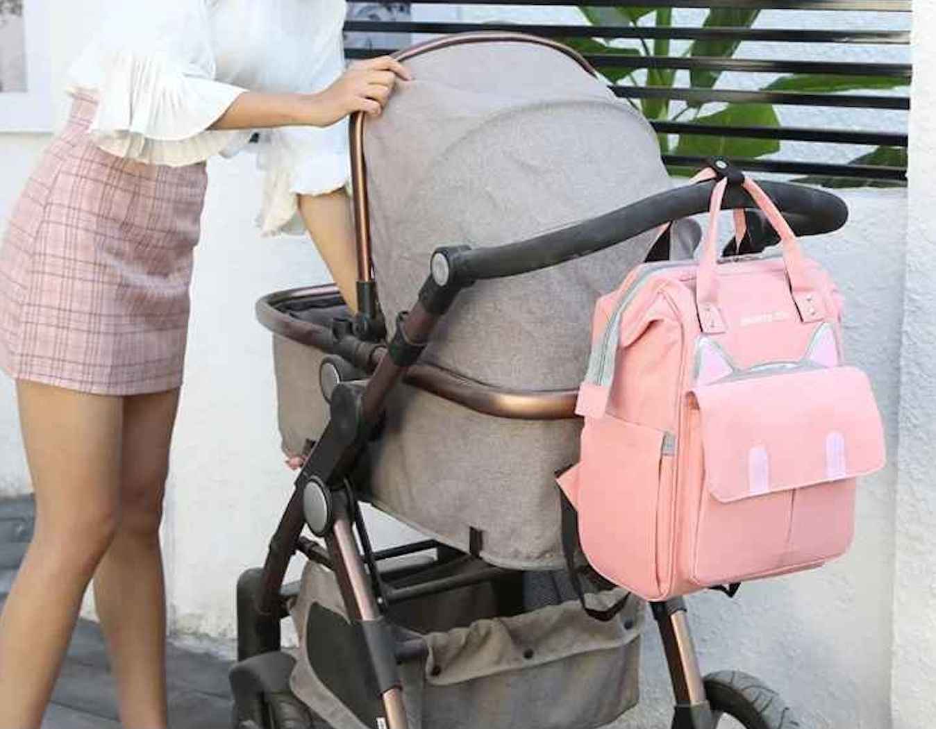 poussette sac a dos a langer rose gatoreille carrousel