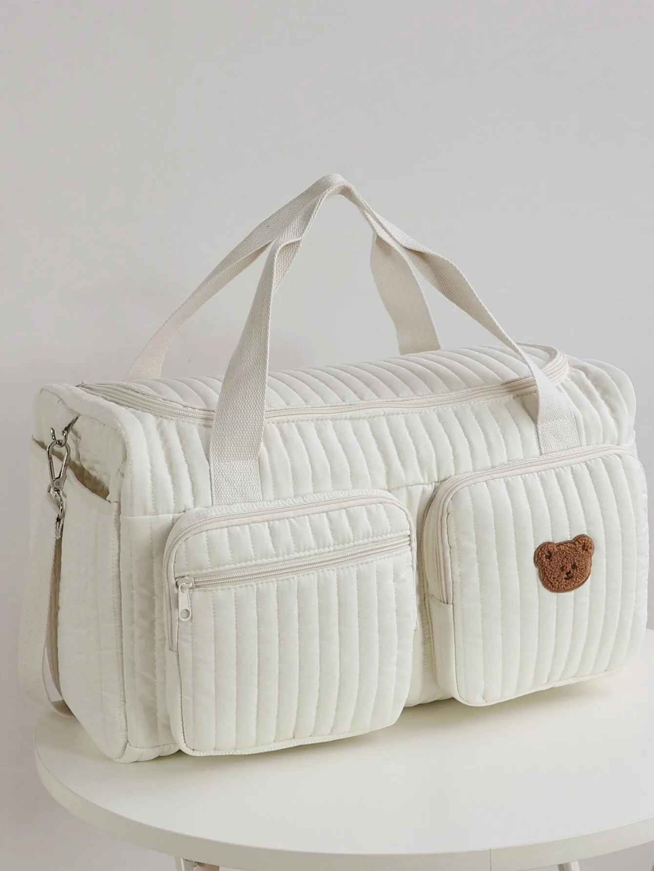 sac a langer oblique ourson solo doudounours carrousel