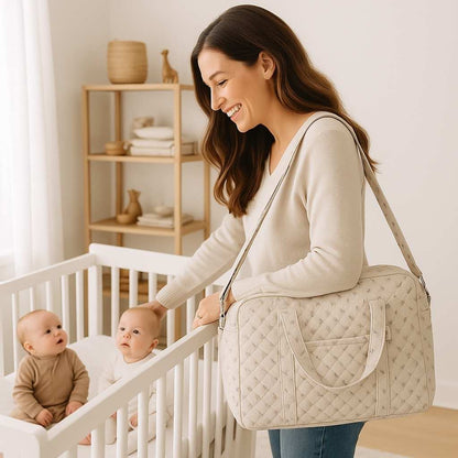 maman sourit bebe jumeaux sac à langer falaroze carrousel