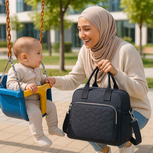 maman sourit bebe sac a langer noir agathe carrousel