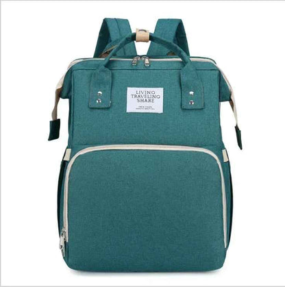 sac à dos à langer vert kodola carrousel
